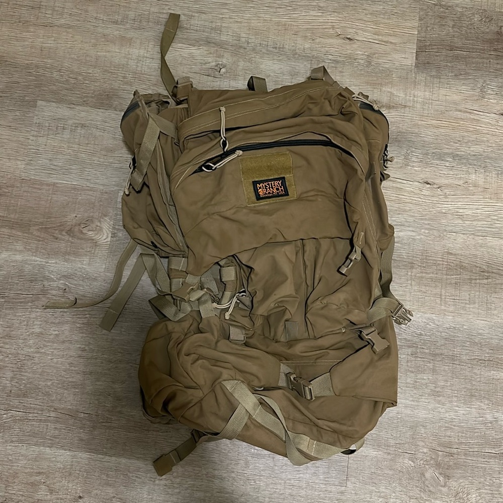 Mystery Ranch Pack. Originally $1100. Good condition. Small stain.